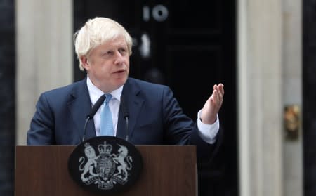 Britain's Prime Minister Boris Johnson addresses the media outside Downing Street in London