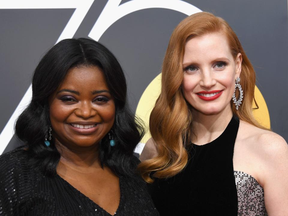 Octavia Spencer and Jessica Chastain pose at the Golden Globe Awards