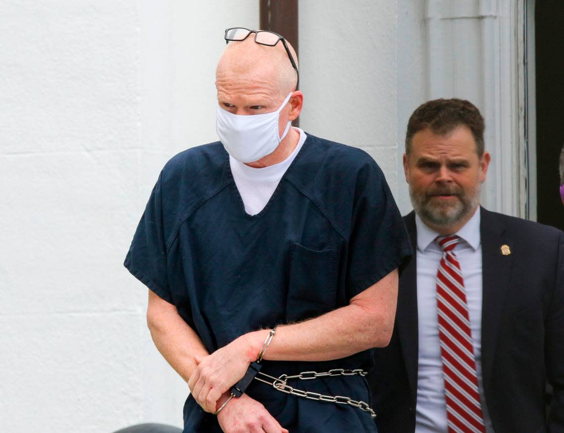 Alex Murdaugh is escorted out of the Colleton County Courthouse in Walterboro on Wednesday, July 20, 2022, after pleading not guilty and being denied  bond hearing on charges of murdering his wife and son.