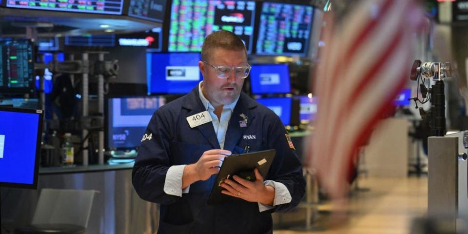 A trader works on the floor of the New York Stock Exchange (NYSE) during morning trading on March 4, 2024 in New York City.