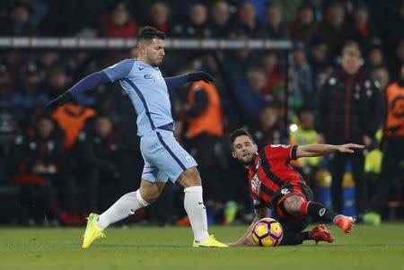 Britain Football Soccer - AFC Bournemouth v Manchester City - Premier League - Vitality Stadium - 13/2/17 Manchester City's Sergio Aguero in action with Bournemouth's Andrew Surman Action Images via Reuters / Matthew Childs Livepic