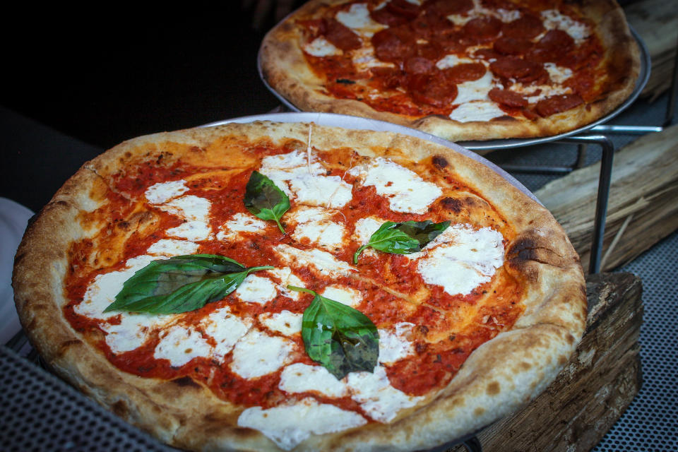 Pizza with basil and fresh mozzarella (Brian Bumby / Getty Images)