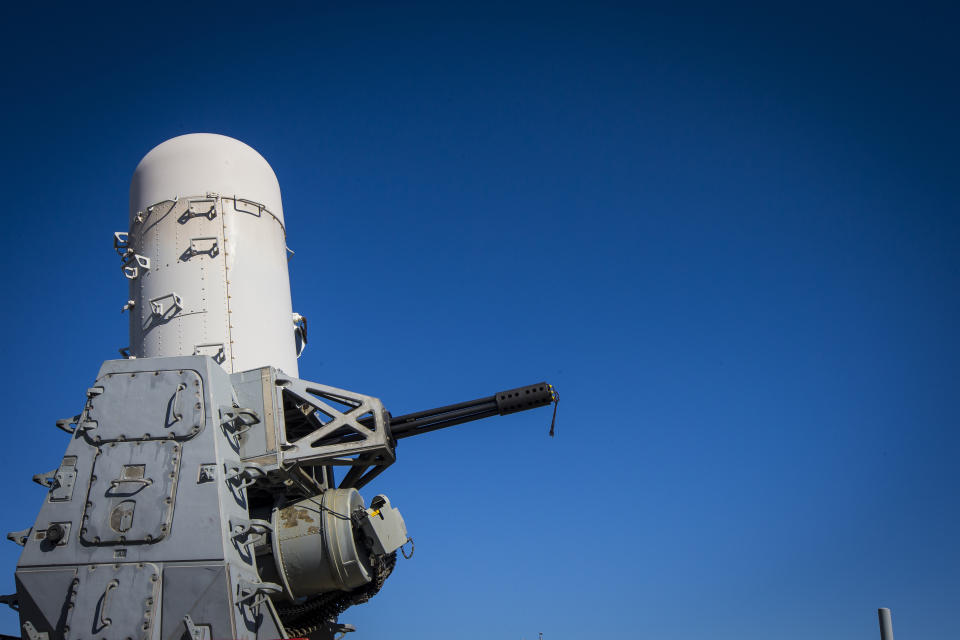 A 20mm Phalanx CIWS weapons defense cannon is mounted on the U.S. Navy destroyer USS Gravely on Tuesday, March 14, 2023. The system is capable of firing thousands of rounds per minute to thwart incoming aircraft, missiles and small boats. (AP Photo/John C. Clark)