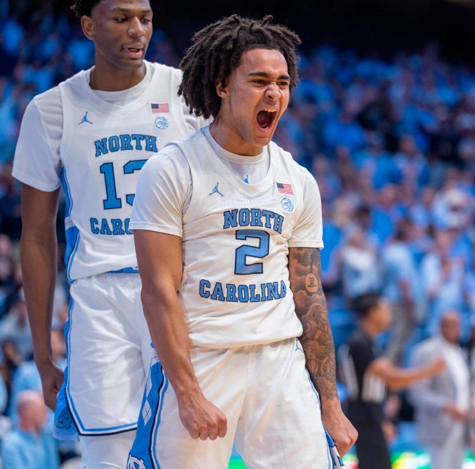 North Carolina’s Elliott Cadeau (2) reacts after making a basket and drawing a foul in the second half against Radford on Monday, November 6, 2023 at the Dean Smith Center in Chapel Hill, N.C.