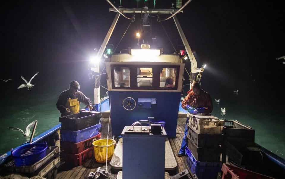 Fishermen in Hastings. Without a deal, Europe's fishing boats will lose access to British waters - GETTY IMAGES