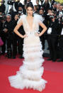 While the model sported nude briefs under her sheer Schiaparelli Haute Couture tulle gown at the Girls of the Sun premiere at Cannes in May 2018, she opted to keep things see-through on top.