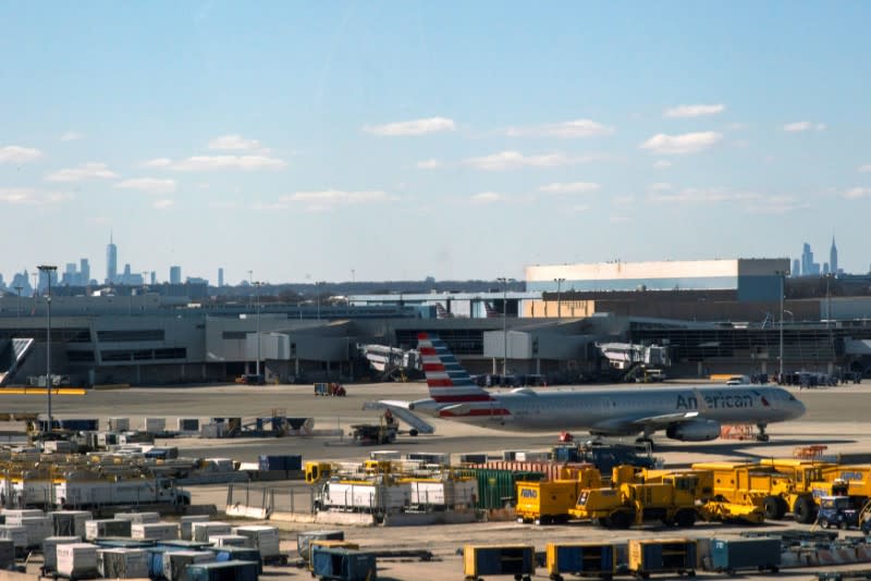 An American airline plane is seen at the tarmac after the Federal Aviation Administration (FAA) temporarily halted flights arriving at New York City airports due to coronavirus disease (COVID-19) in New York