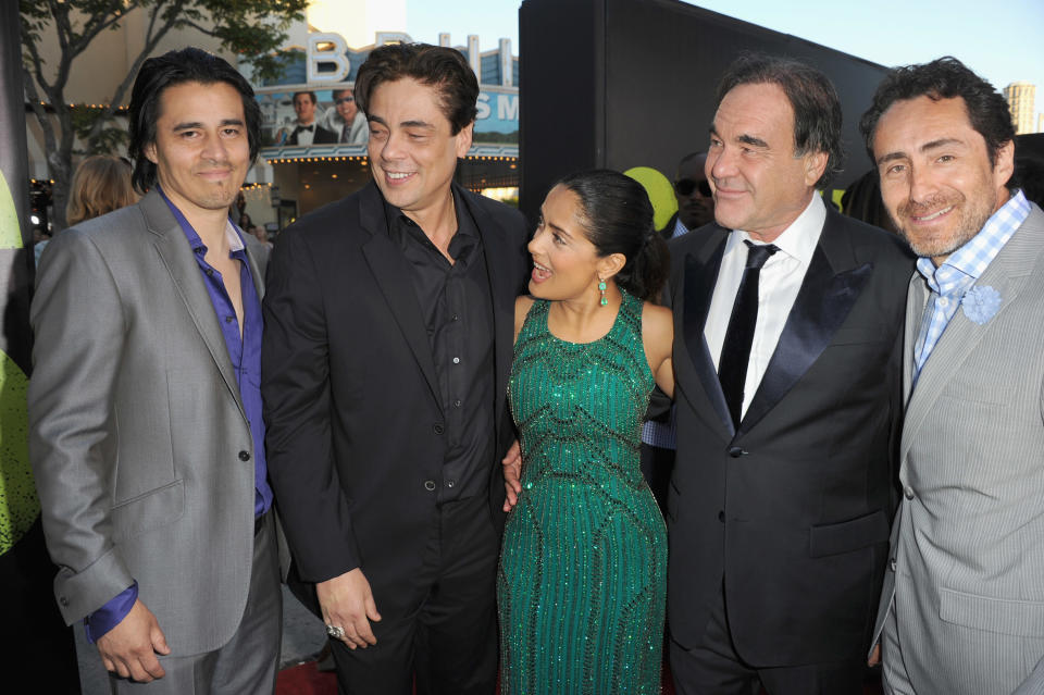 LOS ANGELES, CA - JUNE 25: Actors Antonio Jaramillo, Benicio Del Toro, Salma Hayek, director Oliver Stone and Demian Bichir arrive at Premiere of Universal Pictures' "Savages" at Westwood Village on June 25, 2012 in Los Angeles, California. (Photo by Kevin Winter/Getty Images)