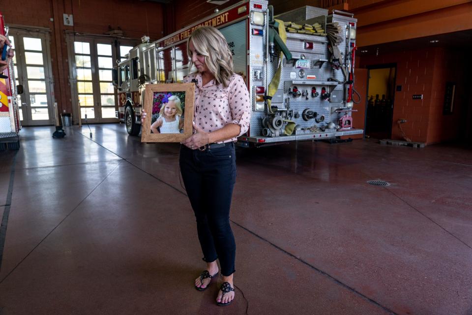 Angela Jones speaks to the media during a hot car demonstration at Phoenix Fire Department Station 61 in Phoenix on May 2, 2023. Jones' 3-year-old daughter Charlotte, known to her family as Charly, died in a hot car incident in 2019.