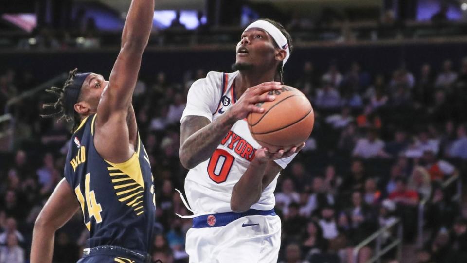 Oct 7, 2022;  New York, New York, United States;  New York Knicks forward Cam Reddish (0) looks to drive past Indiana Pacers guard Buddy Hield (24) in the third quarter at Madison Square Garden.