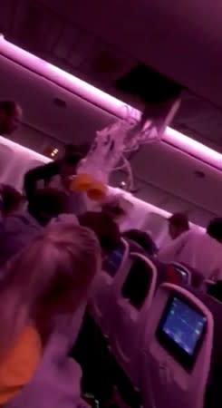 Oxygen masks fall during turbulence in the Air Canada AC 33 flight