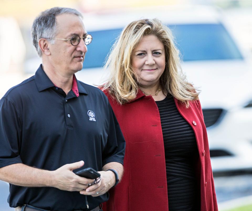 Carolyn Bell, Assistant US Attorney, arrives at the federal courthouse with her husband, attorney Bruce Reinhart, Friday, April 28, 2017.  Dr. Salomon Melgen is facing 76 counts charging him with stealing up to $105 million from Medicare between 2008 and 2013. (Lannis Waters / The Palm Beach Post)