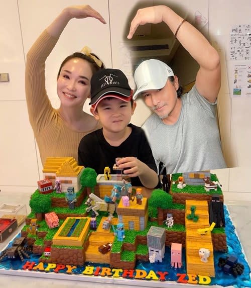 Christopher with his wife, Fann Wong, and their seven year-old son Zed