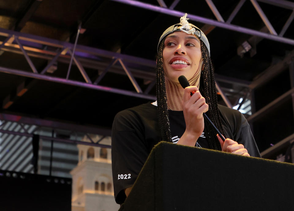 LAS VEGAS, NEVADA - SEPTEMBER 20: Dearica Hamby #5 of the Las Vegas Aces speaks during the team's WNBA championship victory parade and rally on the Las Vegas Strip on September 20, 2022 in Las Vegas, Nevada. The Aces defeated the Connecticut Sun on Sunday in Game Four of the 2022 WNBA Playoffs finals to win the 2022 title. NOTE TO USER: User expressly acknowledges and agrees that, by downloading and or using this photograph, User is consenting to the terms and conditions of the Getty Images License Agreement. (Photo by Ethan Miller/Getty Images)