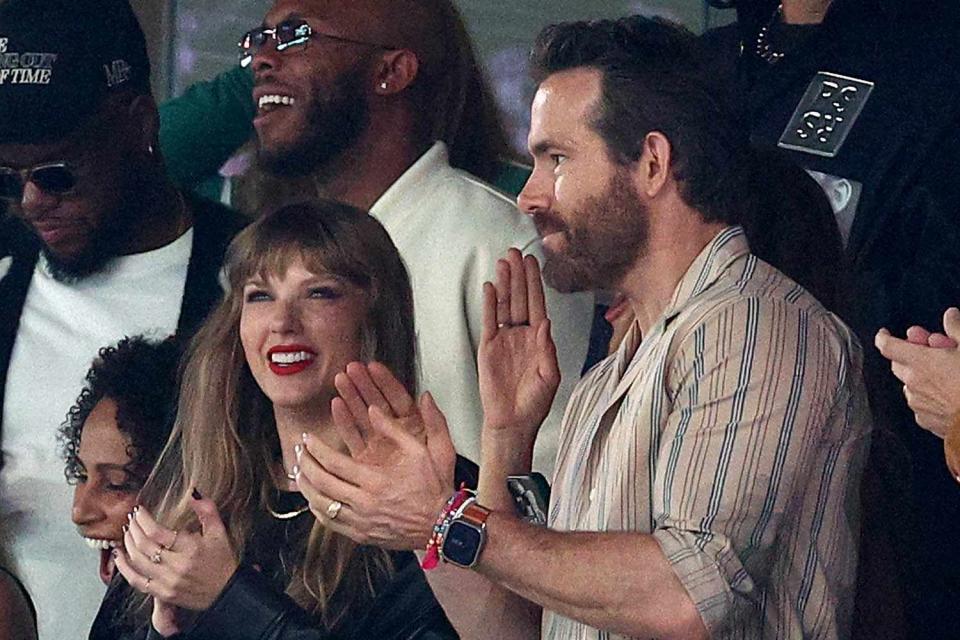 <p>Elsa/Getty</p> Taylor Swift and Ryan Reynolds at the Kansas City Chiefs and New York Jets game in New Jersey in October 2023