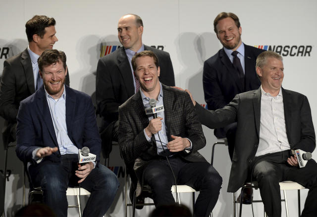 Dale Earnhardt Jr. (L) and Jeff Burton (R) will be part of NBC’s experiment at New Hampshire. Brad Keselowski (C) will be driving in the race. (Jeff Siner/The Charlotte Observer via AP)