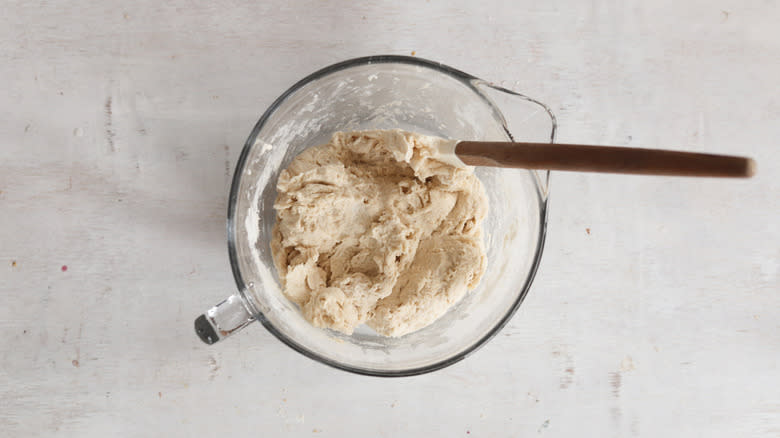 dough in clear measuring cup