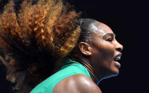 Serena Williams' hair flying around - Credit: AFP