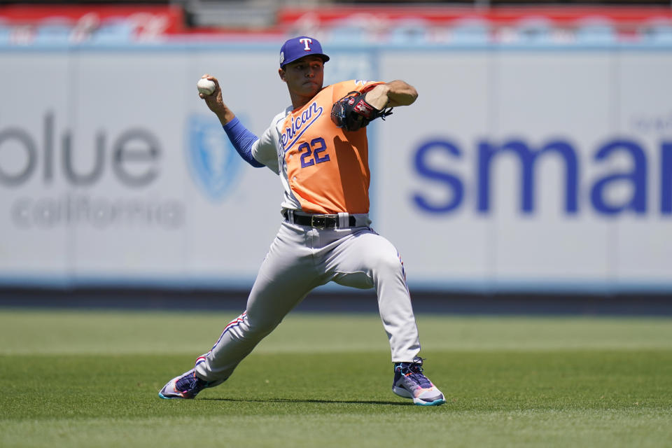 Jack Leiter, of the Texas Rangers, warms up before the MLB All-Star Futures baseball game, Saturday, July 16, 2022, in Los Angeles. (AP Photo/Jae C. Hong)