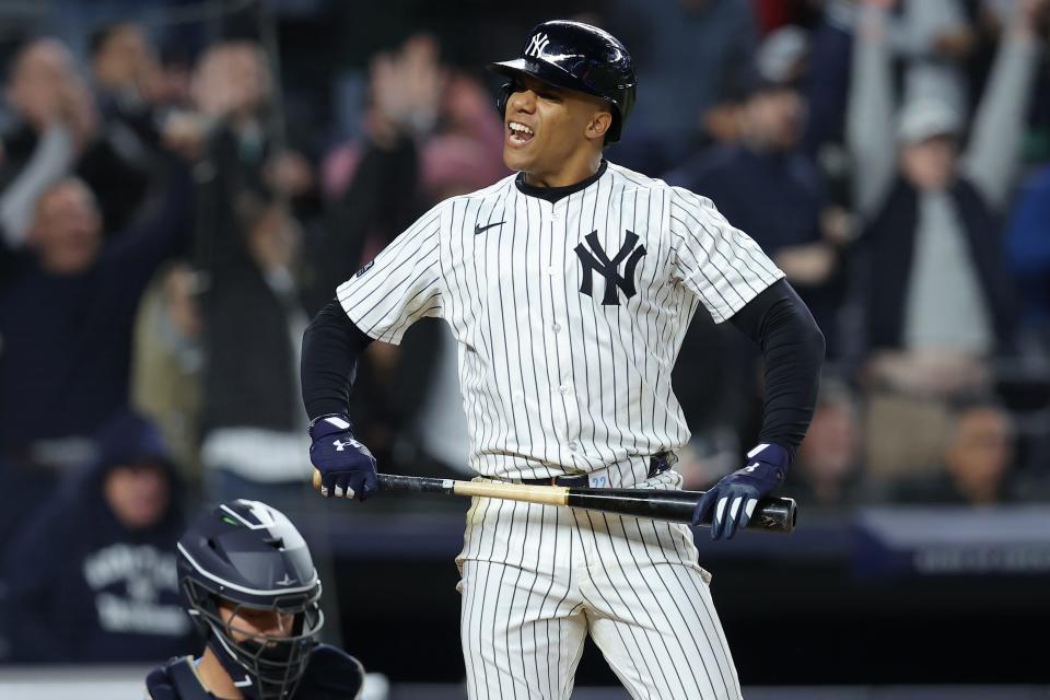 Apr 19, 2024; Bronx, New York, USA; New York Yankees right fielder Juan Soto (22) reacts after hitting a three run home run against the Tampa Bay Rays during the seventh inning at Yankee Stadium. Mandatory Credit: Brad Penner-USA TODAY Sports