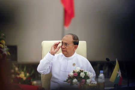 Myanmar's President Thein Sein waits for delegates to arrive for the 17th ASEAN-China Summit during the 25th ASEAN Summit in Naypyitaw November 13, 2014. REUTERS/Soe Zeya Tun