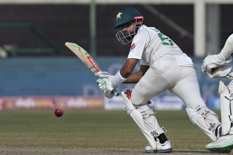 Pakistan's Babar Azam plays a shot during the first day of first test cricket match between Pakistan and New Zealand, in Karachi, Pakistan, Monday, Dec. 26, 2022. (AP Photo/Fareed Khan)