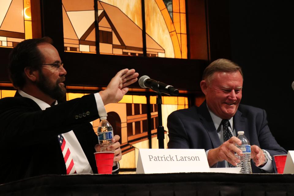 The Republican candidates for Senate District 28, Patrick Larson (left) and Evan Vickers (right), meet at Southern Utah University to participate in a primary debate, June 13, 2022.