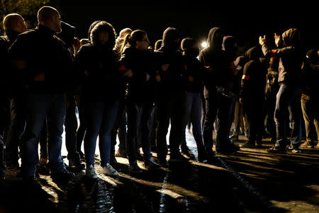 Police officers gather during an unauthorised protest against anti-police violence on the Champs Elysees in Paris, France, early October 20, 2016. REUTERS/Benoit Tessier