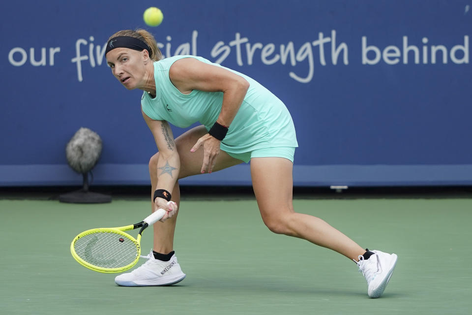 Svetlana Kuznetsova, of Russia, returns to Madison Keys, of the United States, in the women's final match during the Western & Southern Open tennis tournament Sunday, Aug. 18, 2019, in Mason, Ohio. (AP Photo/John Minchillo)