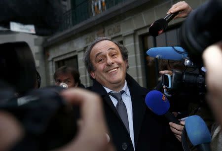 UEFA President Michel Platini speaks to the media as he leaves after a hearing at the Court of Arbitration for Sport (CAS) in Lausanne, Switzerland December 8, 2015. REUTERS/Denis Balibouse