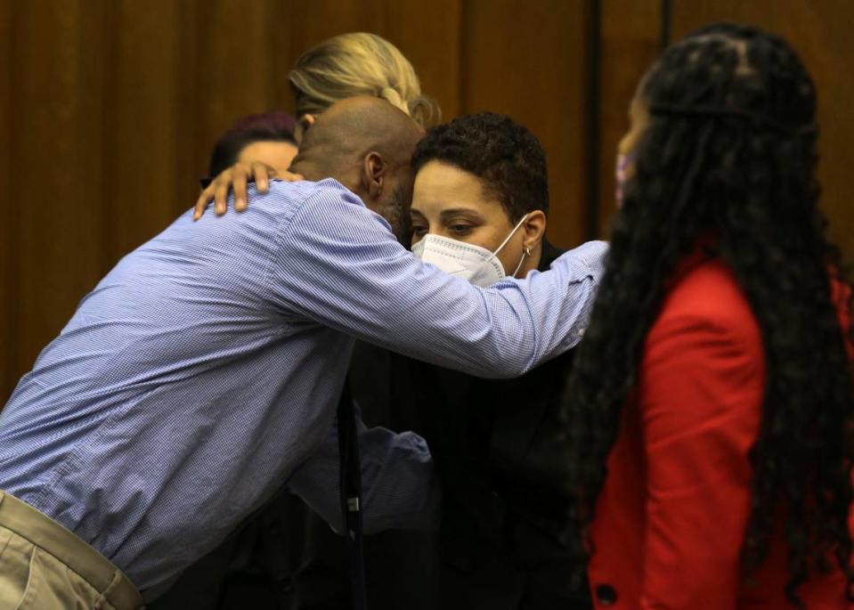 Lamar Johnson, left, embraces St. Louis Prosecutor Kim Garner on Tuesday, Feb. 14, 2023, after St. Louis Circuit Judge David Mason vacated his murder conviction during a hearing in St. Louis, Mo. Johnson served nearly 28 years of a life sentence for a killing that he has always said he didn’t commit.