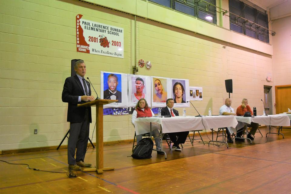 Gov. John Carney, left, is flanked by, from left, Laurel Town Manager Jamie Smith, Mayor John Shwed, Police Chief Danny Wright and Rep. Tim Dukes at an Operation West Laurel meeting at the former Paul Laurence Dunbar Elementary School on Nov. 12, 2023.