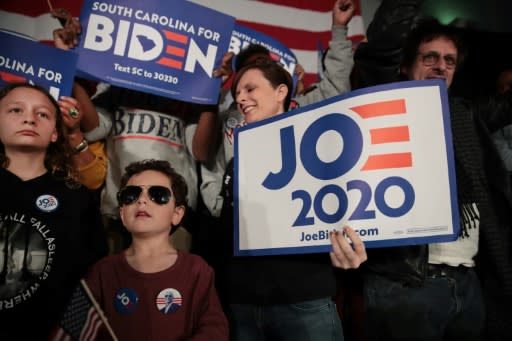 Supporters of Democratic presidential candidate Joe Biden celebrate his South Carolina primary victory