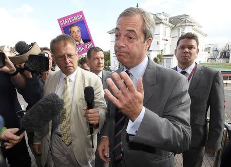 Nigel Farage, the outgoing leader of the United Kingdom Independence Party (UKIP), gestures as he arrives at the party's annual conference in Bournemouth, Britain, September 16, 2016. REUTERS/Toby Melville