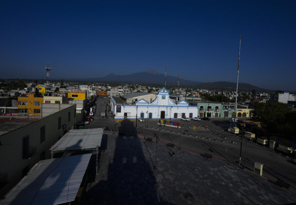 The sun rises in Ixtenco, Mexico, Thursday, June 15, 2023, a town dedicated to the cultivation of organic corn. (AP Photo/Fernando Llano)