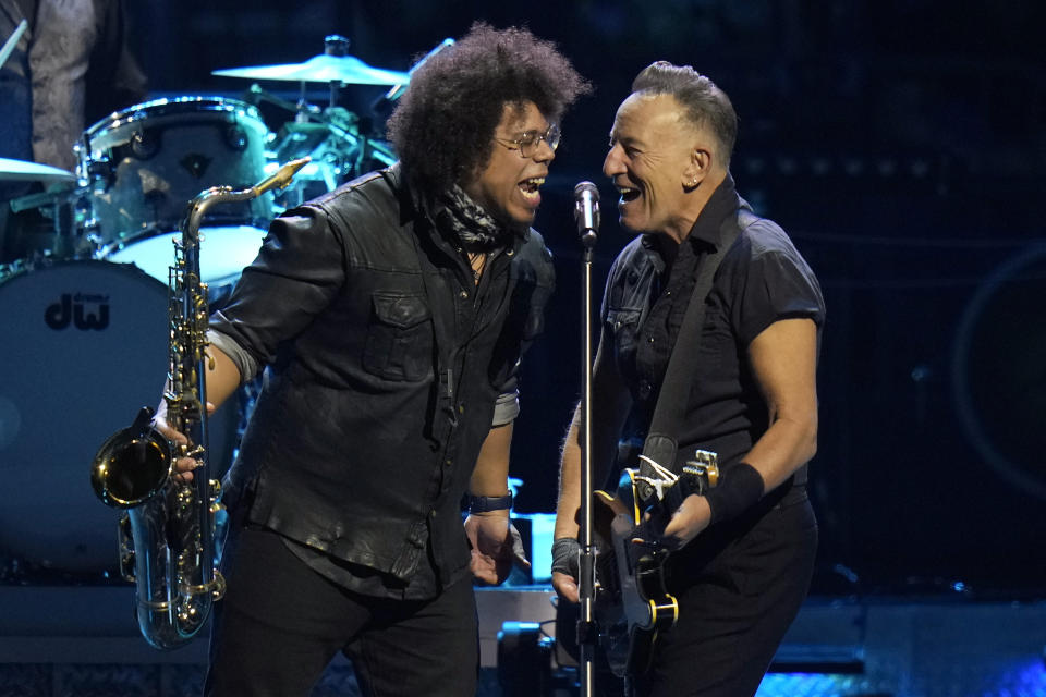 Singer Bruce Springsteen, right, and E Street Band member Jake Clemons perform during their 2023 tour Wednesday, Feb. 1, 2023, at Amalie Arena in Tampa, Fla. (AP Photo/Chris O'Meara)