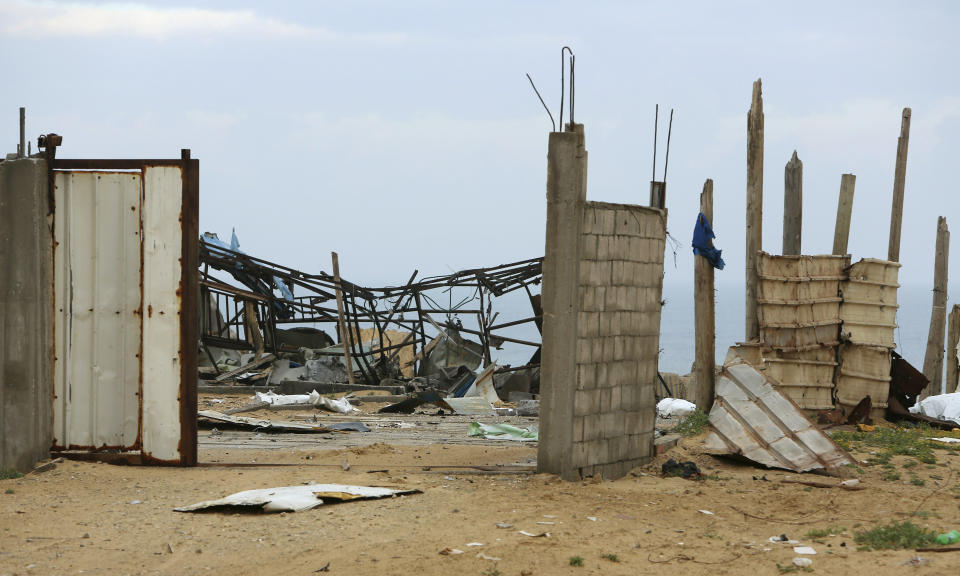 A wreckage of Hamas military site is seen empty after it hit by Israeli airstrikes in Gaza City, early Friday, Friday, March 15, 2019. Israeli warplanes attacked militant targets in the southern Gaza Strip early Friday in response to a rare rocket attack on the Israeli city of Tel Aviv, as the sides appeared to be hurtling toward a new round of violence. (AP Photo/Adel Hana)