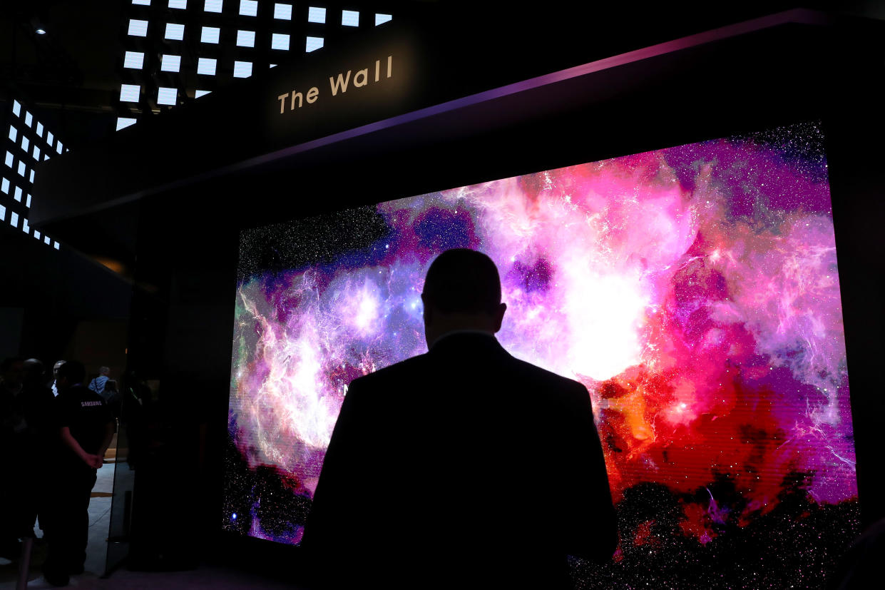 LAS VEGAS, NEVADA - JANUARY 08: An attendee looks at the Samsung The Wall: MicroLED Display at the Samsung booth during CES 2019 at the Las Vegas Convention Center on January 8, 2019 in Las Vegas, Nevada. CES, the world's largest annual consumer technology trade show, runs through January 11 and features about 4,500 exhibitors showing off their latest products and services to more than 180,000 attendees.  (Photo by Justin Sullivan/Getty Images)