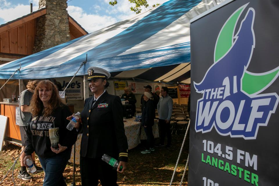 U.S. Navy Lieutenant Dr. Dana Robinson-Street, of Hilliard, walks out of the WLOH Radio tent as they were celebrating their 75th anniversary at the Fairfield County Fair on October 9. Robinson-Street was invited to the fair as a guest speaker and to administered the Oath of Enlistment for the Military Homecoming at the fair.