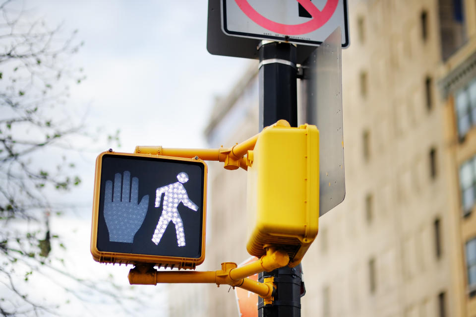 A walking signal at a New York crossing. The fake petition claimed people were offended by the figure.