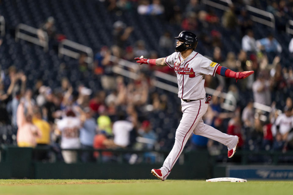 Atlanta Braves' Orlando Arcia advances toward home base to score on a home run RBI hit in by Braves' Kevin Pillar during the fourth inning of the second game of a baseball doubleheader against the Washington Nationals, Sunday, Sept. 24, 2023, in Washington. (AP Photo/Stephanie Scarbrough)