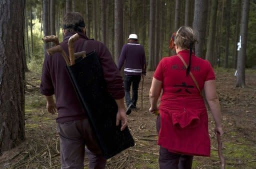 "Forest Golfers" take part in a golf tournament in a forest near Uvaly village, east of Prague. A group of Czech "forest golfers" have pioneered a novel approach to an extreme form of golf in the wilds of Bohemia on terrain that would usually be out of bounds on a regular course