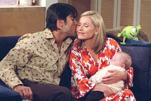 <p>Virginia Sherwood/Disney General Entertainment Content via Getty</p> Mark Consuelos and Kelly Ripa and "Baby Enzo" on "All My Children"