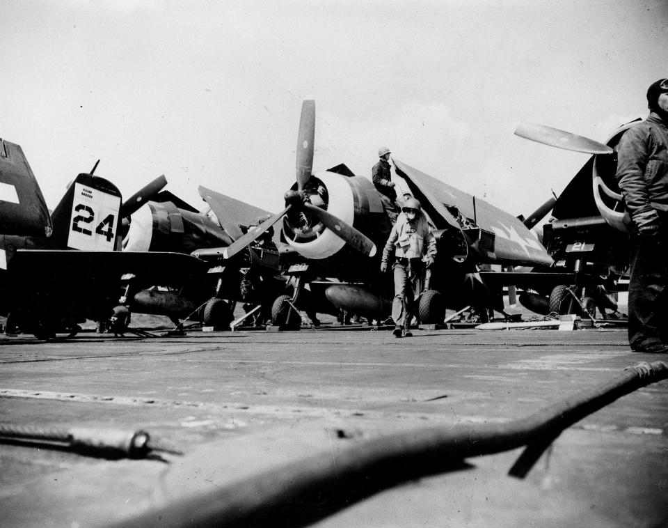 F6F Hellcats of Fighter Squadron 45 are pictured March 18, 1945, aboard the aircraft carrier USS San Jacinto off Kyushu, Japan. Lt. Charles W. Wilson of Tecumseh flew Hellcats and would have been aboard the San Jacinto when this picture was taken.