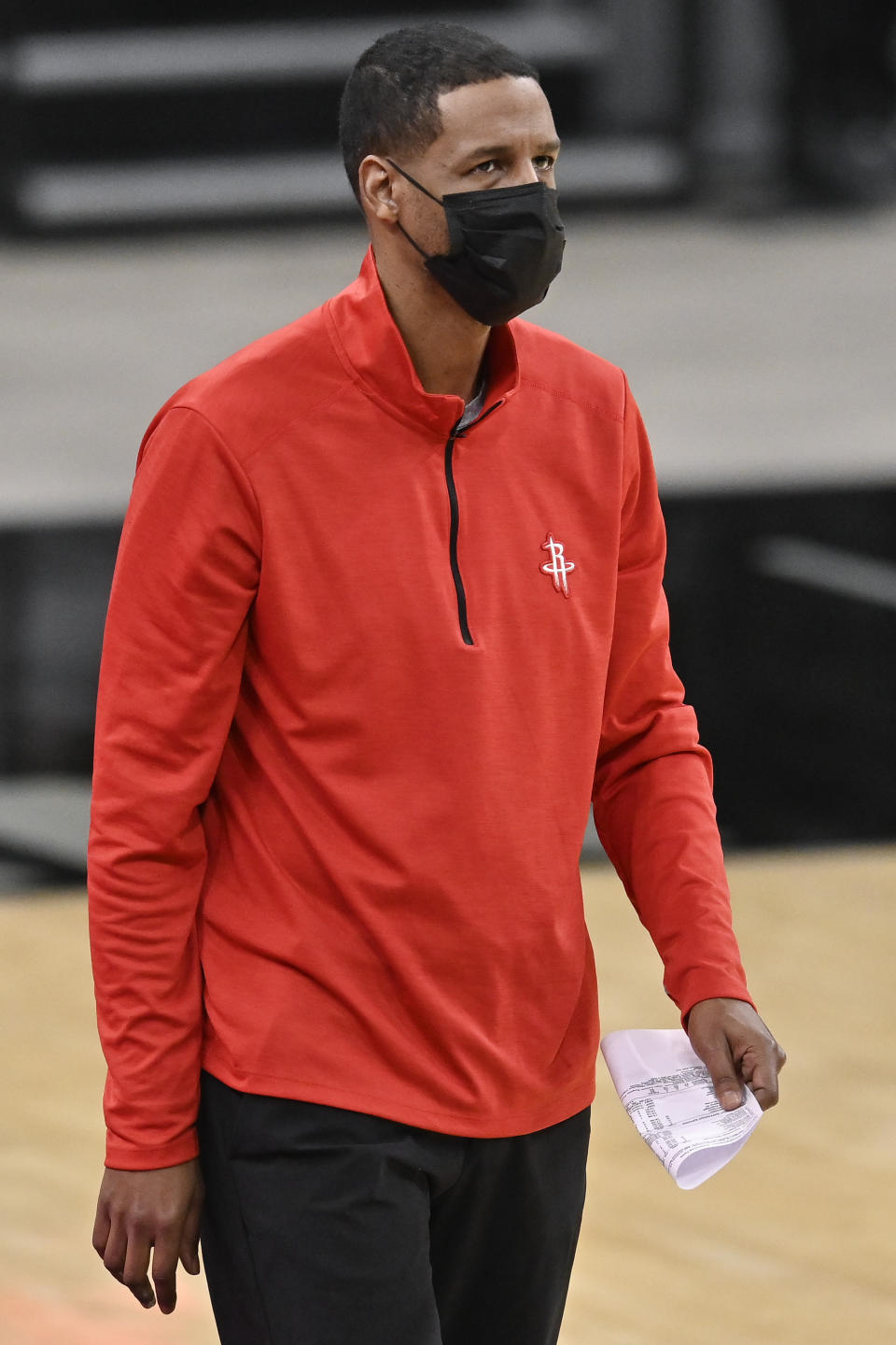 Houston Rockets head coach Stephen Silas watches play during the second half of an NBA basketball game against the San Antonio Spurs, Saturday, Jan. 16, 2021, in San Antonio. (AP Photo/Darren Abate)