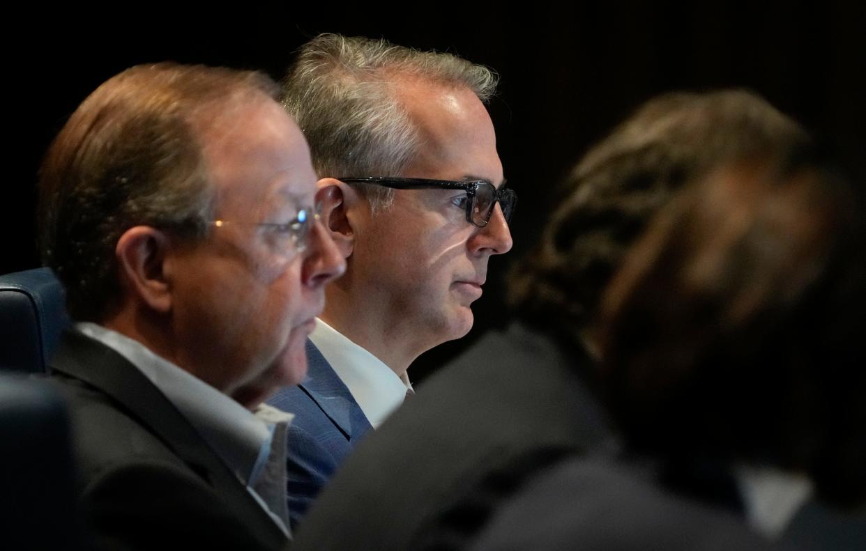 Electric Reliability Council of Texas CEO Pablo Vegas, right, listens at an ERCOT board meeting on Tuesday December 19, 2023.