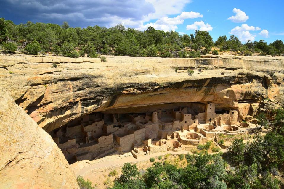 Cliff Palace is seen from the trail approaching the site in Mesa Verde National Park, Colorado