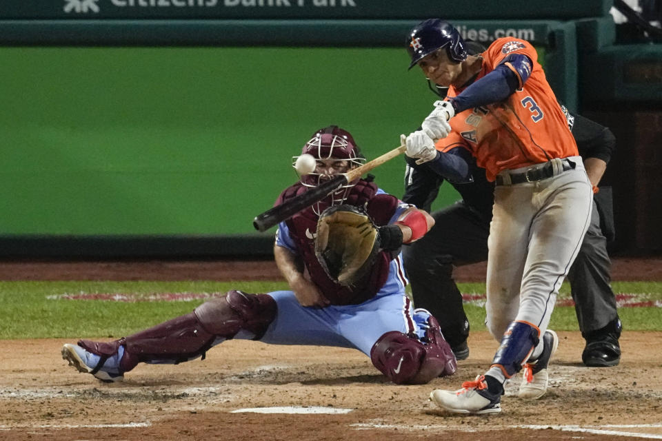 Houston Astros' Jeremy Pena hits a home run during the fourth inning in Game 5 of baseball's World Series between the Houston Astros and the Philadelphia Phillies on Thursday, Nov. 3, 2022, in Philadelphia. (AP Photo/Matt Rourke)