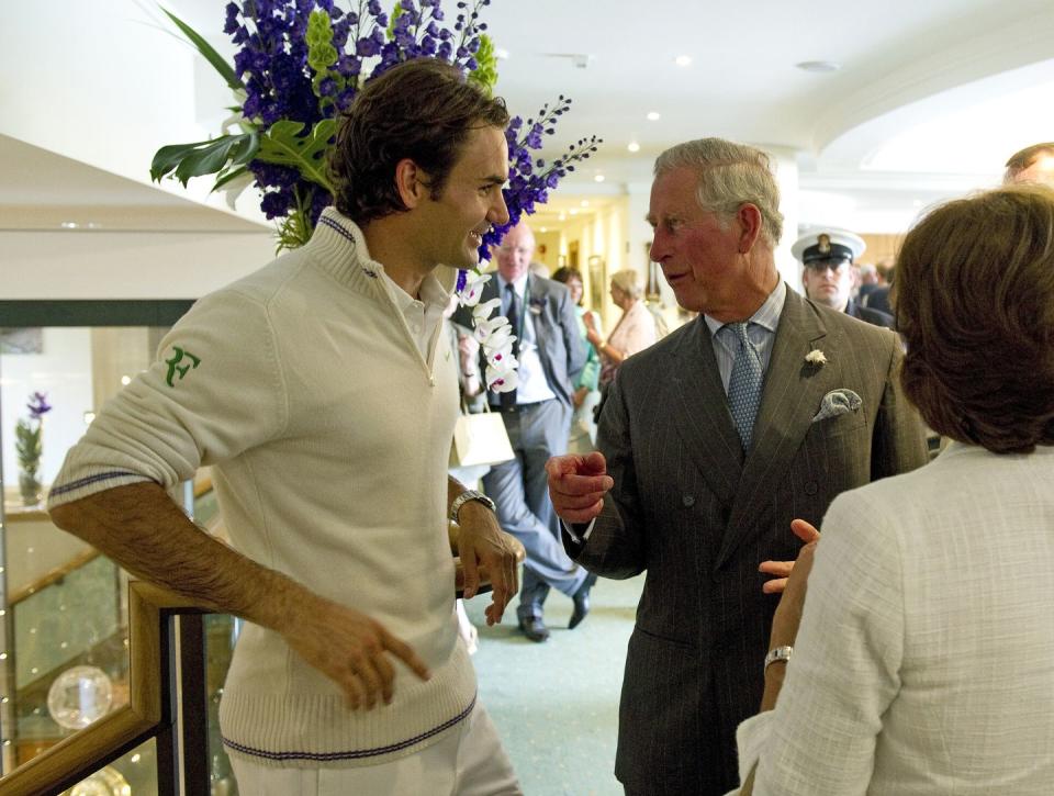 <p>Prince Charles and Roger Federer on day three of the 2012 championship.</p>