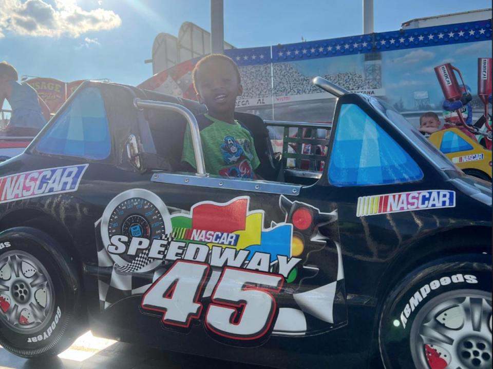 Jamison Beck, 4, is pictured here in a toy car. Jamison Beck was fatally hit by a car after he wandered out of his house in the middle of night on July 8 (Courtesy of Nicole Carter)